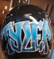 
              Airbrushed angry ball helmet
            