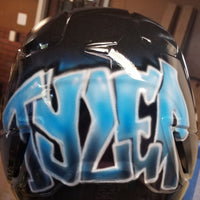 Airbrushed angry ball helmet